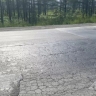 "Асфальт превращается в кашу": автоледи показала качество ямочного ремонта на трассе Южно-Сахалинск - Оха