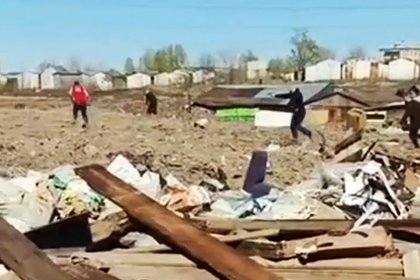 На свалке в российском регионе произошла перестрелка и попала на видео