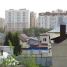 В городе дома дороже квартир, но "квадрат" в них - дешевле