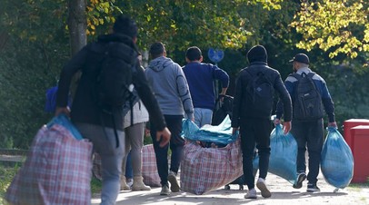 Дмитриев поддержал решение Мерца о высылке сирийских беженцев из Германии